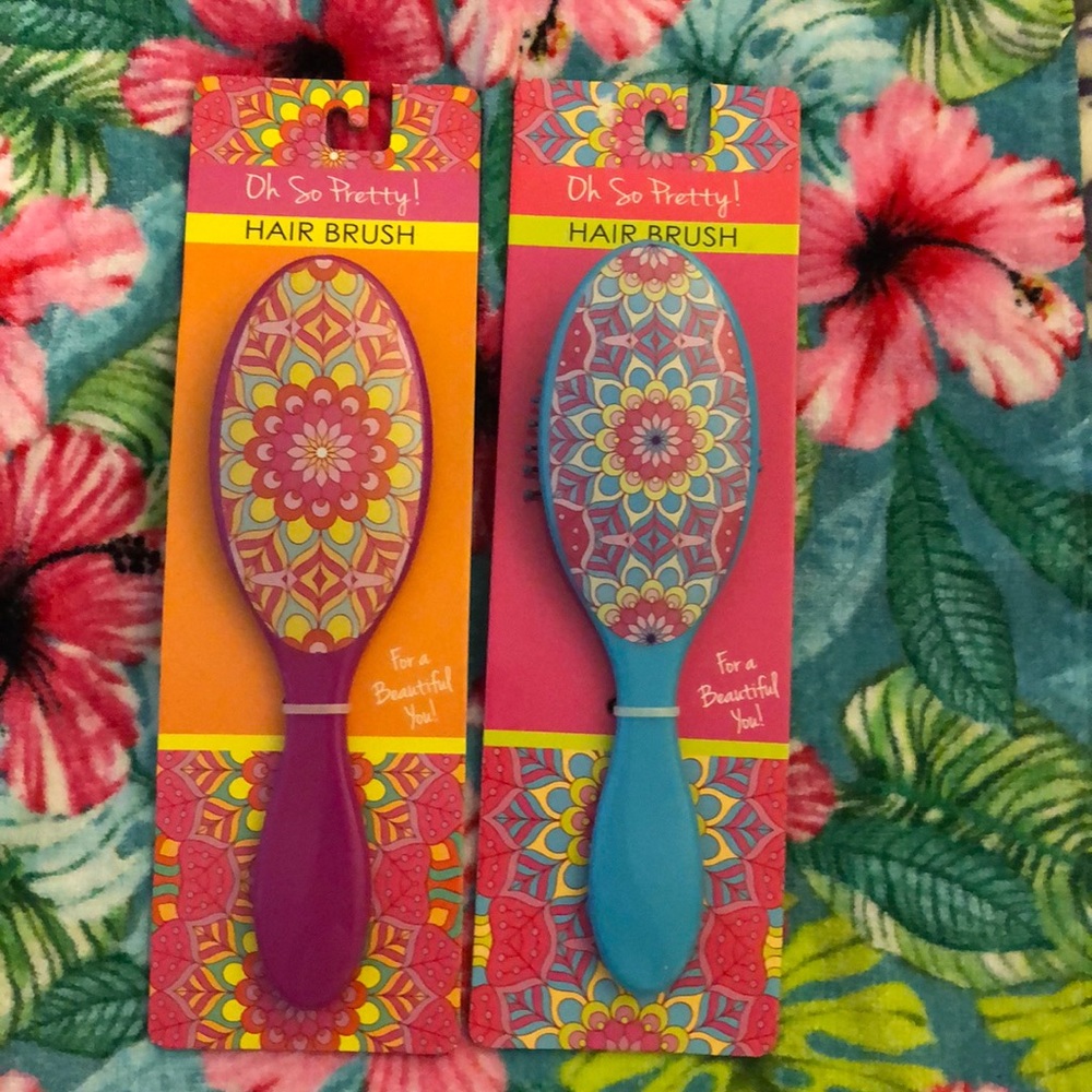 Two brand new hairbrushes